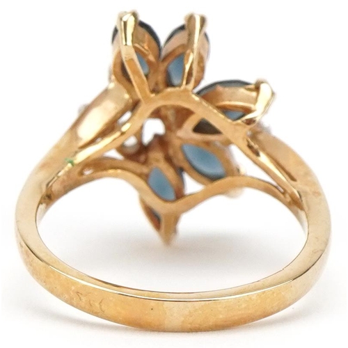 3234 - Yellow metal blue and clear stone floral ring, size K, 2.4g