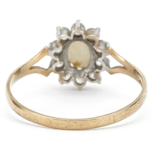 3231 - Unmarked gold cabochon opal and clear stone cluster ring with split shoulders, size R, 1.6g