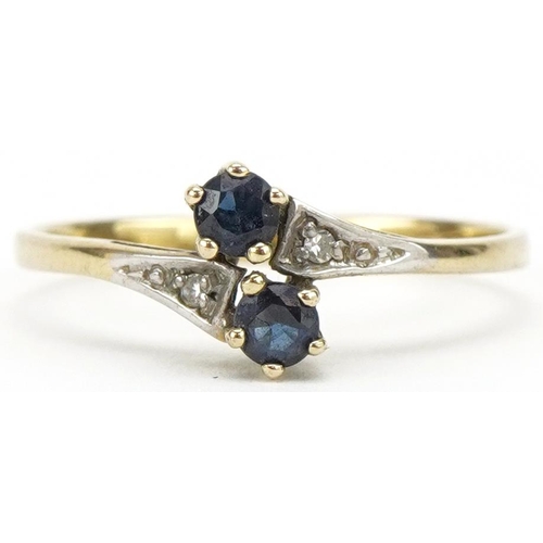 3431 - 9ct gold diamond and sapphire crossover ring, size P, 1.4g