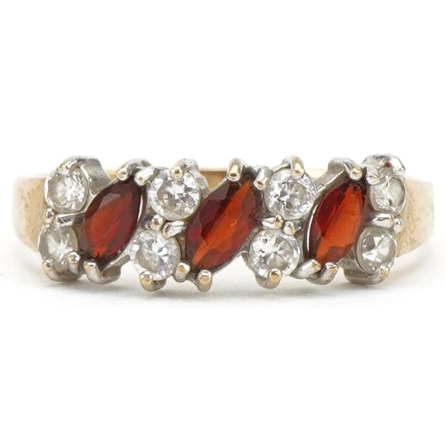 3276 - 9ct gold garnet and clear stone two row ring set with eleven stones, size R, 1.7g