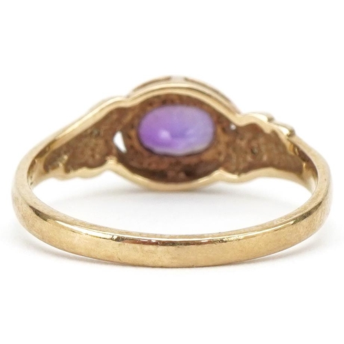 3243 - 9ct gold amethyst ring with diamond set shoulders, size L/M, 1.8g