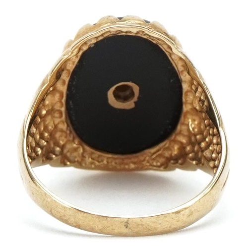 3417 - 9ct gold golfing interest black onyx signet ring, size L/M, 3.7g