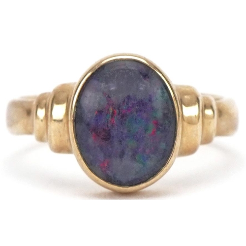 3223 - 9ct gold cabochon opal ring with stepped shoulders, size M, 3.8g