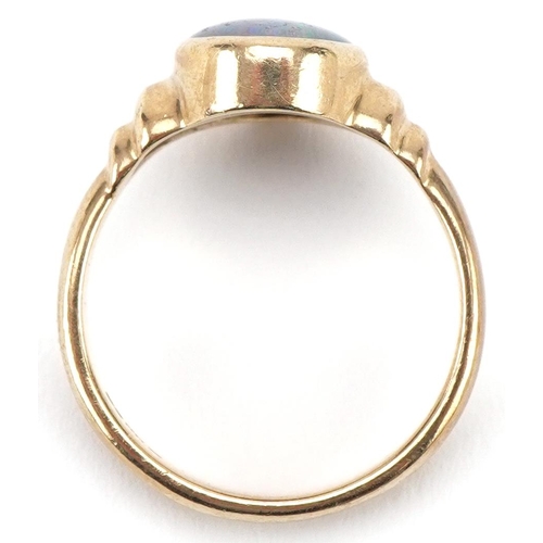 3223 - 9ct gold cabochon opal ring with stepped shoulders, size M, 3.8g