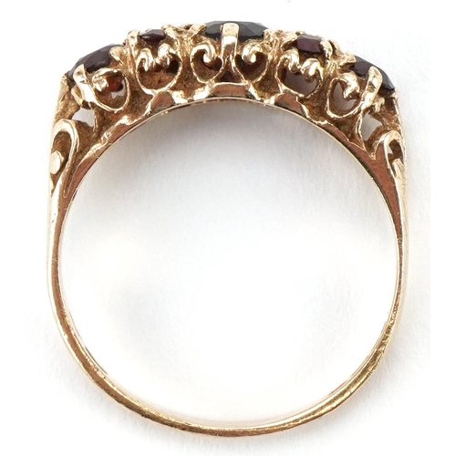 3179 - Victorian style 9ct gold garnet cluster ring with ornate setting, size N, 2.2g