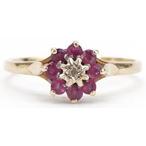 3198 - 9ct gold diamond and pink spinel flower head ring, size O, 1.6g