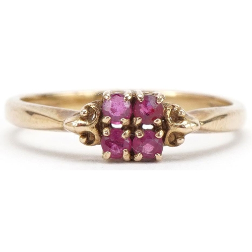 3287 - 9ct gold ruby cluster ring with scrolled shoulders, size L/M, 1.8g