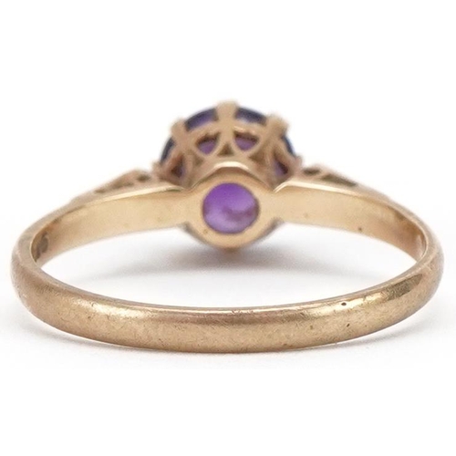 3137 - 9ct gold amethyst solitaire ring, size N/O, 1.8g