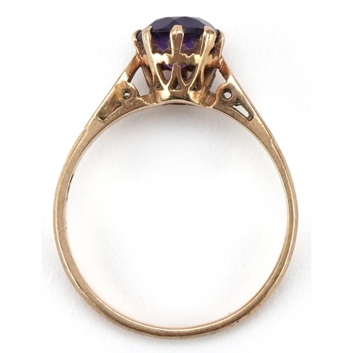 3137 - 9ct gold amethyst solitaire ring, size N/O, 1.8g