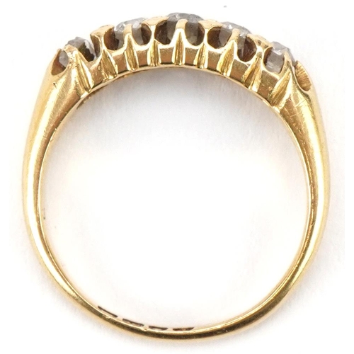 3045 - 18ct gold graduated diamond ring, size L/M, 3.9g