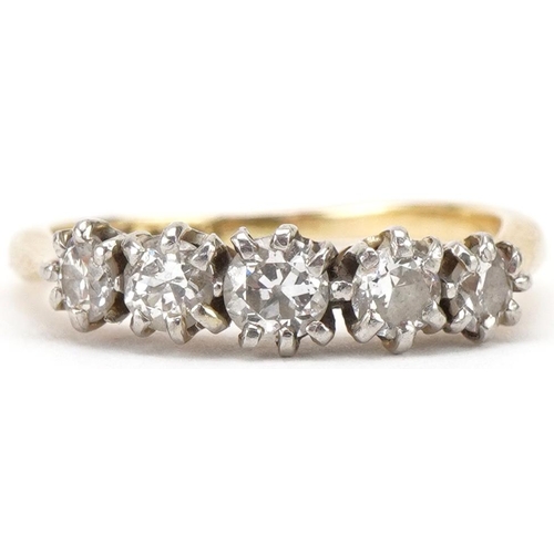 3014 - 18ct gold and platinum graduated diamond five stone ring, the largest diamond approximately 3.0mm in... 