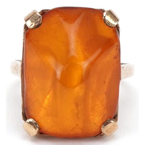 3430 - 9ct gold amber ring, the amber approximately 19.10mm x 14.4mm x 8.80mm deep, size L, 4.9g