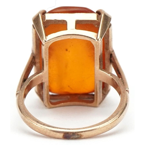 3430 - 9ct gold amber ring, the amber approximately 19.10mm x 14.4mm x 8.80mm deep, size L, 4.9g