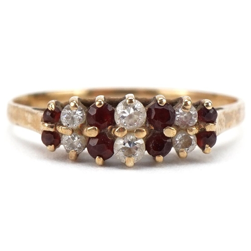 3266 - 9ct gold garnet and clear stone two row cluster ring, size L, 1.3g