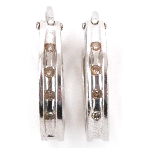 3226 - Pair of 9ct white gold diamond hoop earrings, each 1.3cm in diameter, total 1.6g