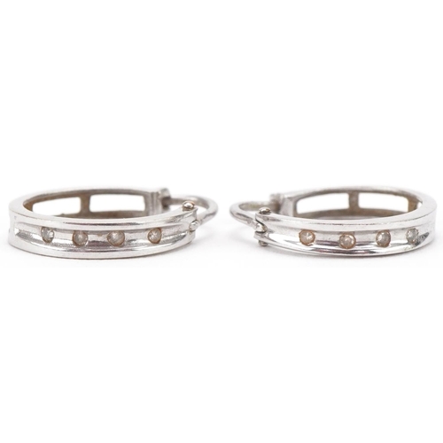 3226 - Pair of 9ct white gold diamond hoop earrings, each 1.3cm in diameter, total 1.6g