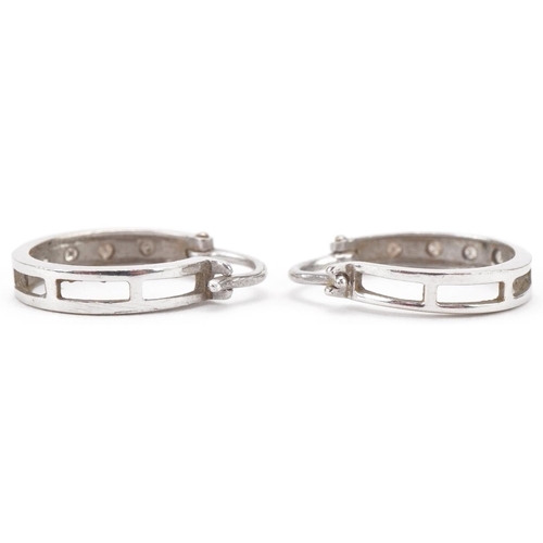 3226 - Pair of 9ct white gold diamond hoop earrings, each 1.3cm in diameter, total 1.6g