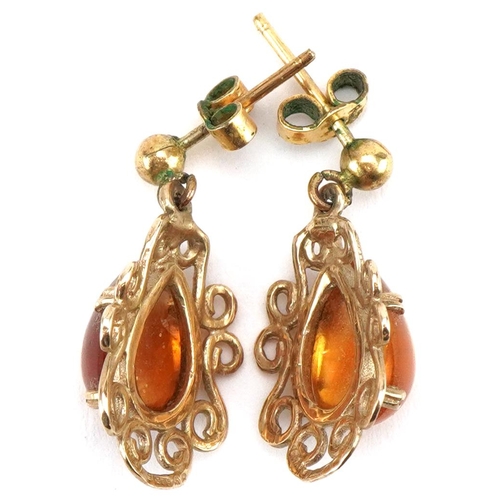 3460 - Pair of 9ct gold amber teardrop openwork earrings, each 2.1cm high, total 2.9g