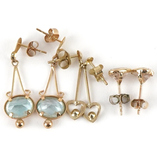 3481 - Three pairs of 9ct gold earrings including a pair of blue topaz drop earrings, the largest 2.6cm hig... 