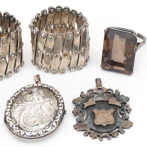 3527 - Antique and later silver and white metal jewellery including oval locket, sports jewel, smoky quartz... 