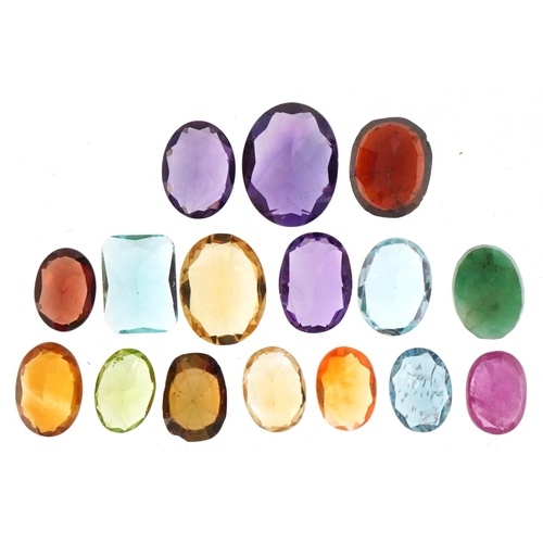 3515 - Loose semi precious stones including amethyst, citrine, topaz and garnet