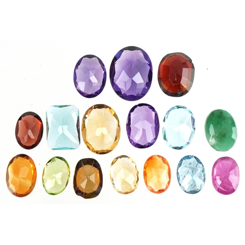 3515 - Loose semi precious stones including amethyst, citrine, topaz and garnet