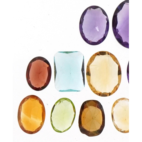 3515 - Loose semi precious stones including amethyst, citrine, topaz and garnet