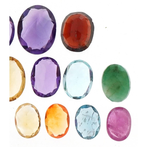 3515 - Loose semi precious stones including amethyst, citrine, topaz and garnet