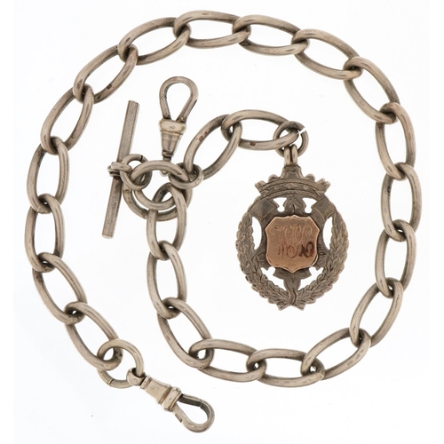 3513 - Silver watch chain with T bar, two swivelling dog clip clasps and sports jewel, 35cm in length, 69.0... 