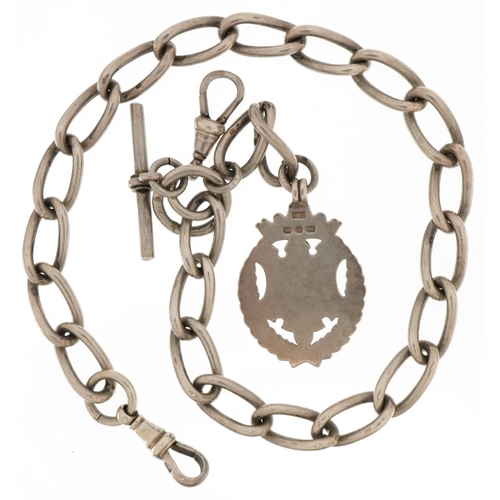 3513 - Silver watch chain with T bar, two swivelling dog clip clasps and sports jewel, 35cm in length, 69.0... 