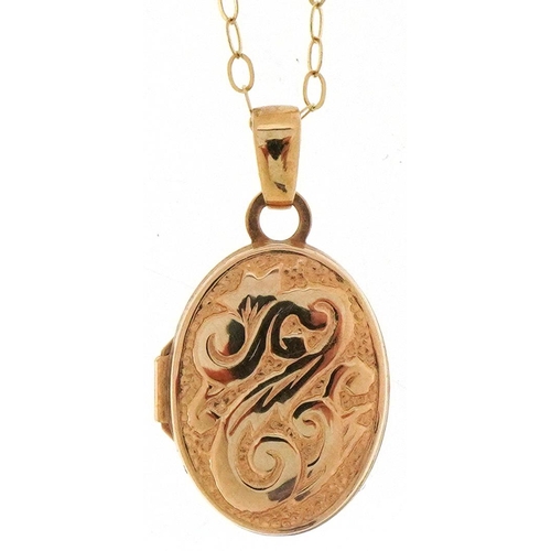 3484 - 9ct gold floral engraved locket on a 9ct gold necklace, the locket 1.9cm high, total 1.2g