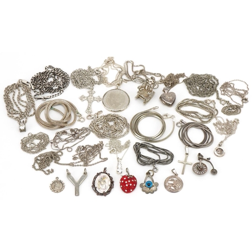 3505 - Large collection of silver and white metal jewellery including pendants on chains, charms and bracel... 