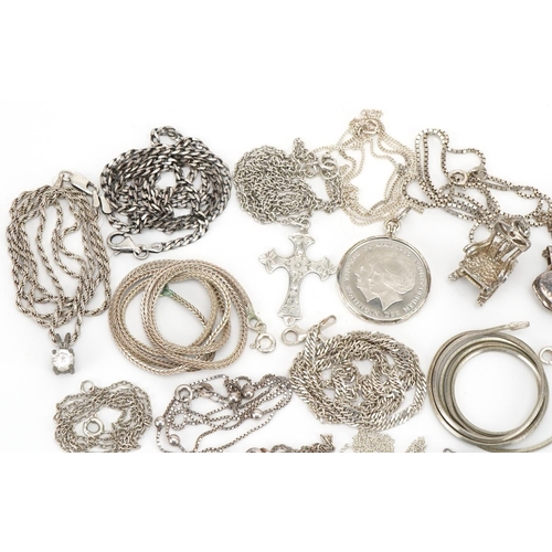 3505 - Large collection of silver and white metal jewellery including pendants on chains, charms and bracel... 