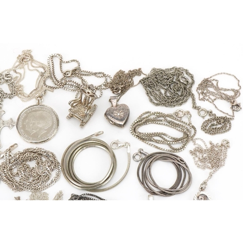 3505 - Large collection of silver and white metal jewellery including pendants on chains, charms and bracel... 