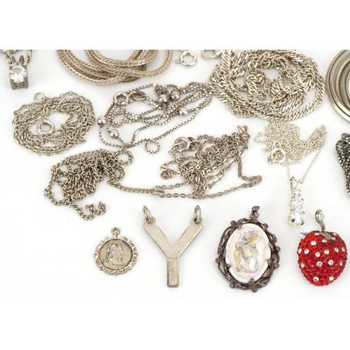 3505 - Large collection of silver and white metal jewellery including pendants on chains, charms and bracel... 