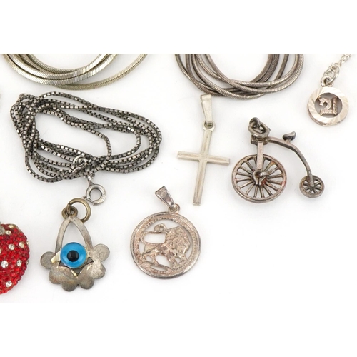 3505 - Large collection of silver and white metal jewellery including pendants on chains, charms and bracel... 