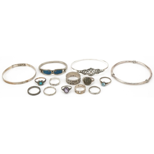 3524 - Silver and white metal jewellery comprising four bracelets and ten rings, some set with semi preciou... 