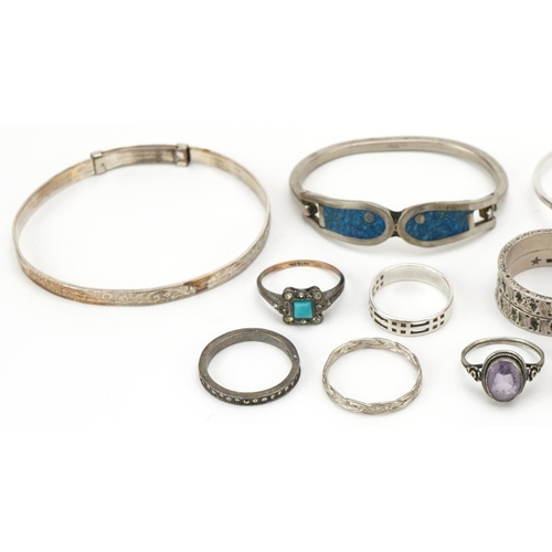 3524 - Silver and white metal jewellery comprising four bracelets and ten rings, some set with semi preciou... 