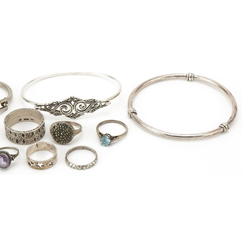 3524 - Silver and white metal jewellery comprising four bracelets and ten rings, some set with semi preciou... 