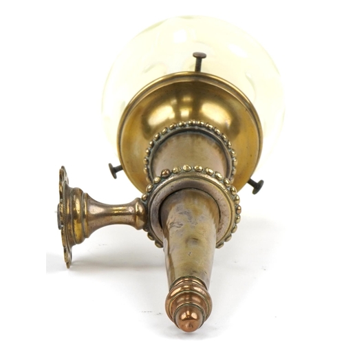 87 - Arts & Crafts brass wall light with Vaseline glass shade, 37cm in length