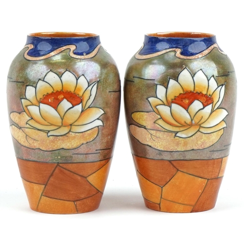 395 - Harold Bennett for Burleigh Ware a pair of stylized floral vases numbered 4897 and signature mark to... 