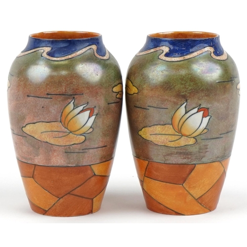 395 - Harold Bennett for Burleigh Ware a pair of stylized floral vases numbered 4897 and signature mark to... 