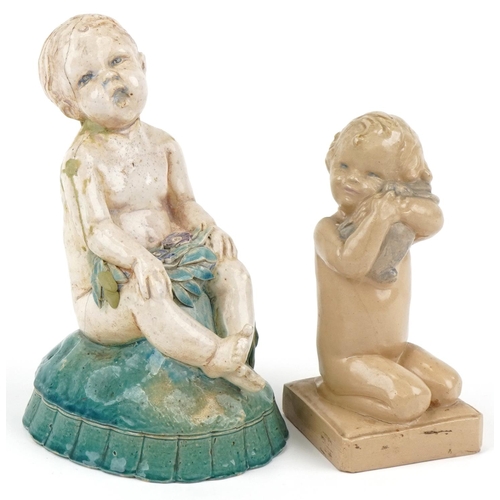 233 - Archeson pottery figure of a baby girl with her rabbit together with pottery figure of boy signed Pe... 