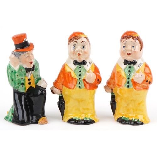 422 - Three hand painted pottery Alice in Wonderland figures, Mad Hatter, Tweedle Dee and Tweedle Dum, eac... 