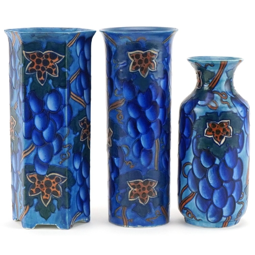 299 - Three Charlotte Rhead for Bursley Ware Blue Grape design vases, numbered 585 to the bases, the large... 