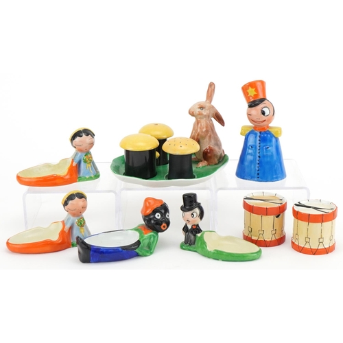 424 - Carlton Ware bellboy table bell, novelty ashtrays, cruet set and drums, the largest 13cm high