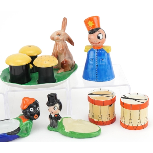 424 - Carlton Ware bellboy table bell, novelty ashtrays, cruet set and drums, the largest 13cm high