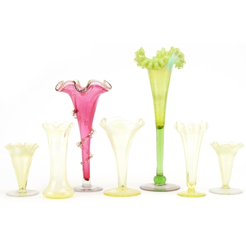 290 - Vaseline glass to include fluted and cranberry glass vases, the largest 30cm high