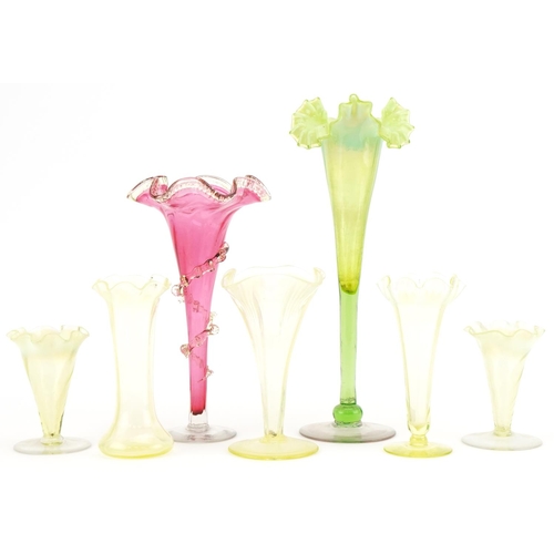 290 - Vaseline glass to include fluted and cranberry glass vases, the largest 30cm high