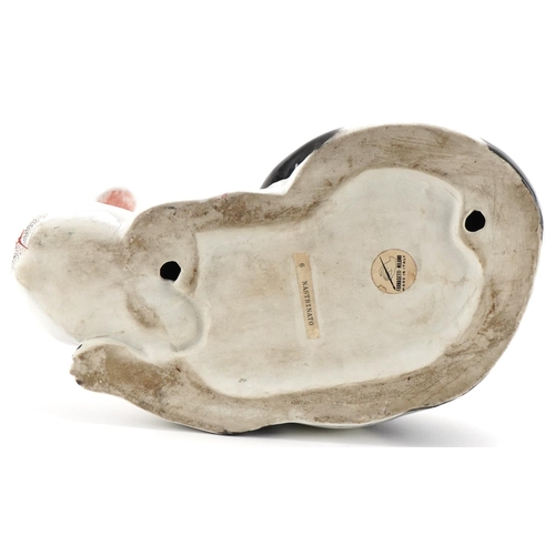 2109 - Fornasetti-Milano, Italian hand painted pottery sleeping cat, paper labels to the base, 30cm in leng... 